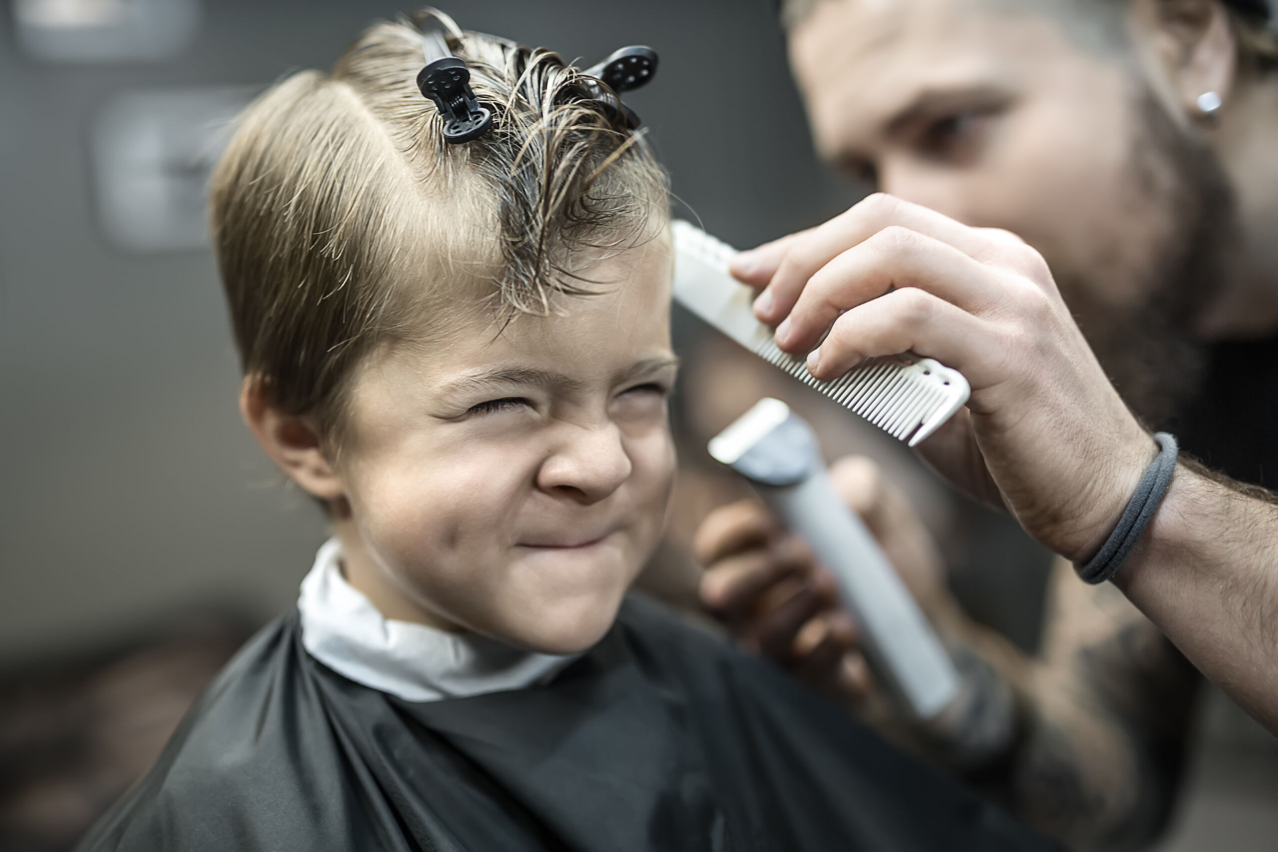 Barbershops put books in hands of kids getting haircuts